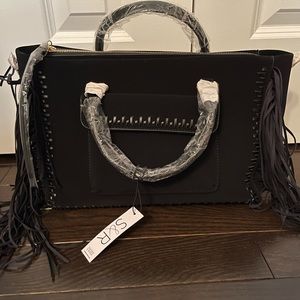 Faux suede black purse with fringe!